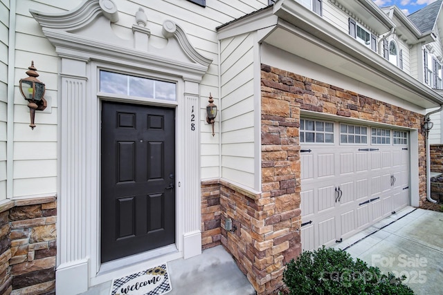 property entrance featuring a garage