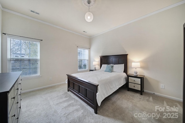 bedroom with light carpet and crown molding