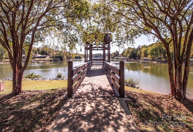 dock area featuring a water view