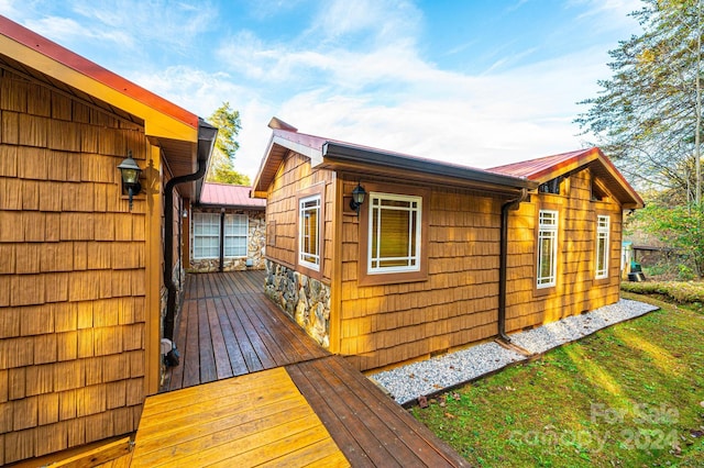 exterior space featuring a wooden deck