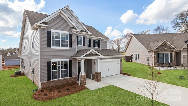 craftsman-style home with a front lawn