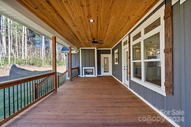 wooden deck with ceiling fan