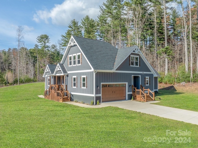 view of front facade with a garage and a front yard