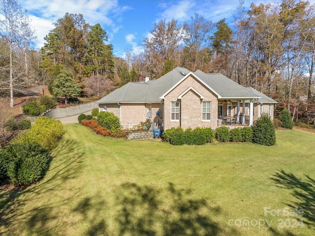 view of property exterior featuring a lawn