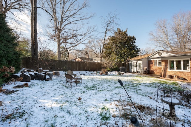 view of yard covered in snow