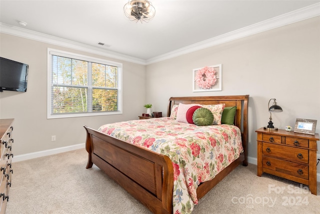 bedroom with light colored carpet and ornamental molding