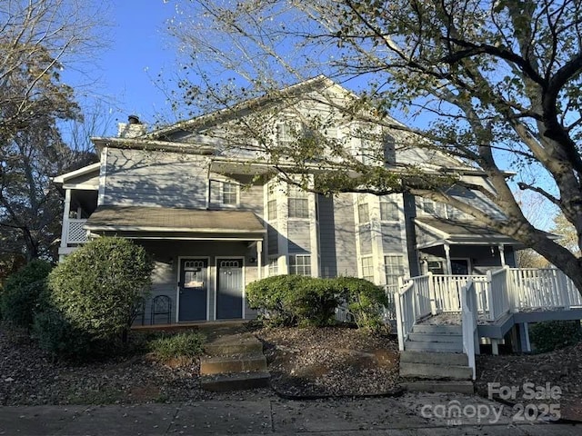 view of front of home with a chimney