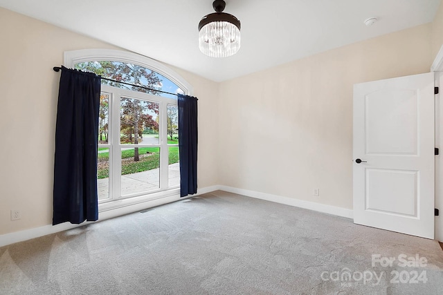 view of carpeted spare room