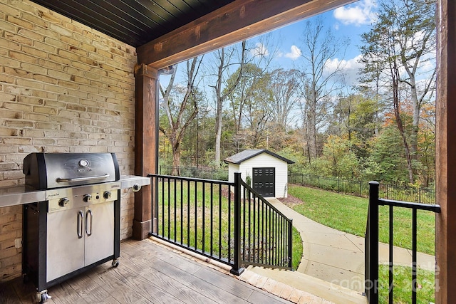 view of patio / terrace with a shed