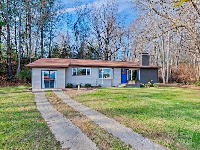 ranch-style house with a front lawn