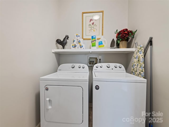 laundry area featuring washing machine and dryer