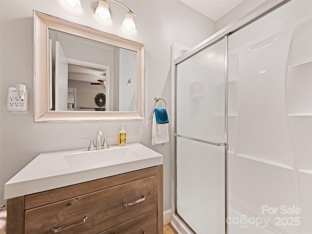 bathroom with vanity and walk in shower