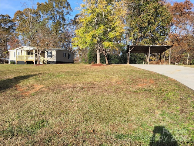 view of yard featuring a carport