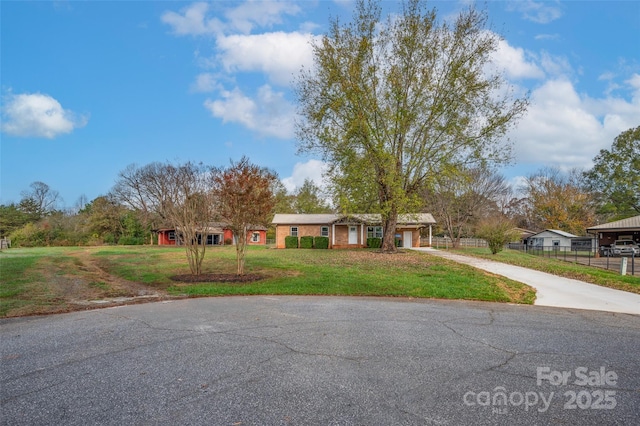 view of front of home with a front lawn