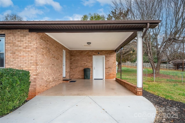 view of patio featuring a carport