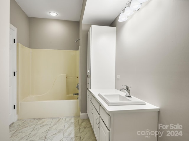 bathroom with vanity and shower / bathtub combination