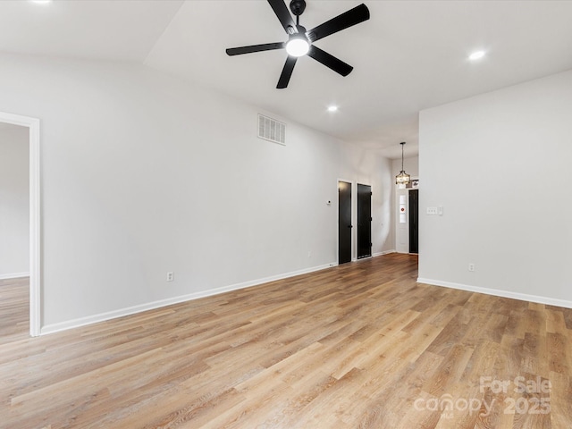 empty room featuring light hardwood / wood-style floors and ceiling fan