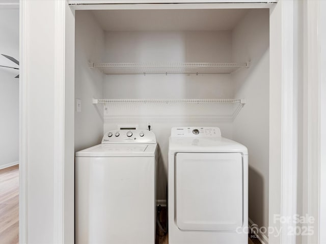 laundry area with independent washer and dryer