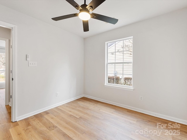 unfurnished room featuring ceiling fan and light hardwood / wood-style flooring