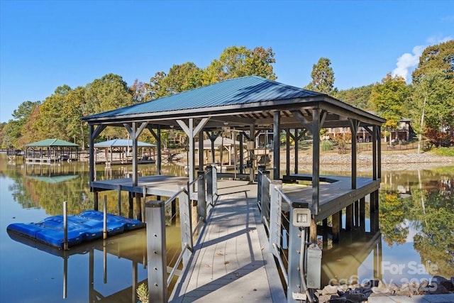 view of dock featuring a water view