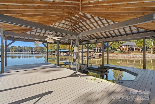 view of dock featuring a water view and boat lift