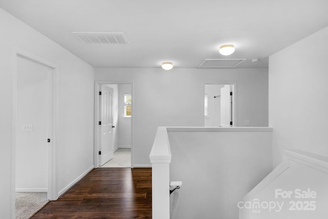 hallway featuring wood-type flooring