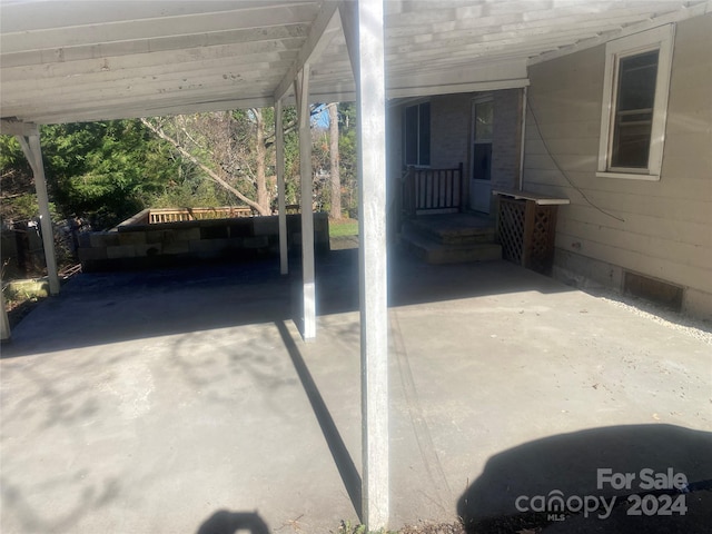 view of patio featuring a carport