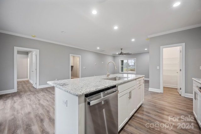 kitchen with dishwasher, a center island with sink, white cabinets, ornamental molding, and light hardwood / wood-style floors