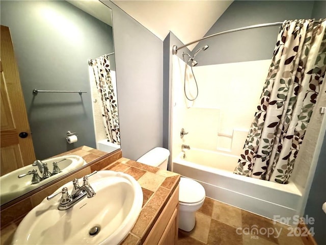 full bathroom featuring vanity, toilet, and shower / tub combo