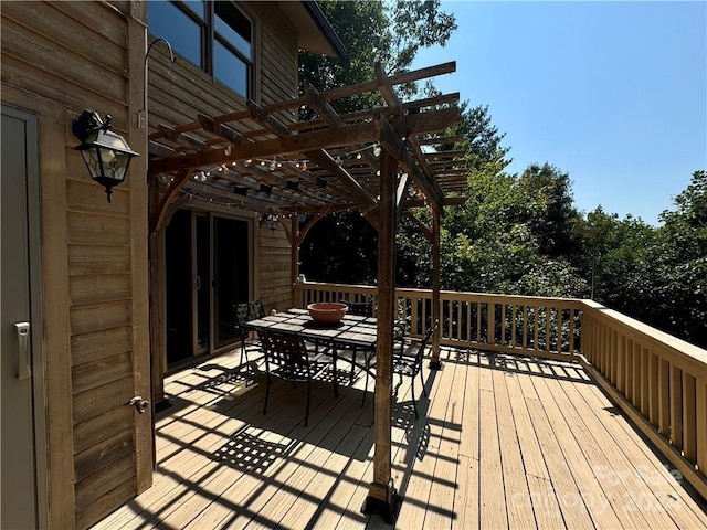 wooden terrace with a pergola