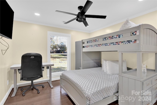 bedroom featuring ceiling fan, hardwood / wood-style floors, and ornamental molding