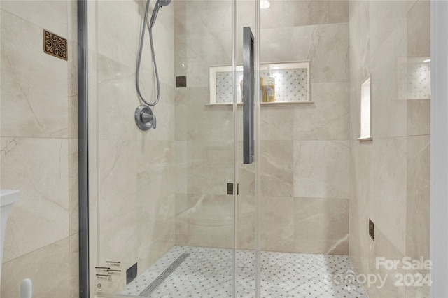 bathroom with an enclosed shower