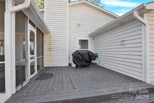 wooden terrace with grilling area