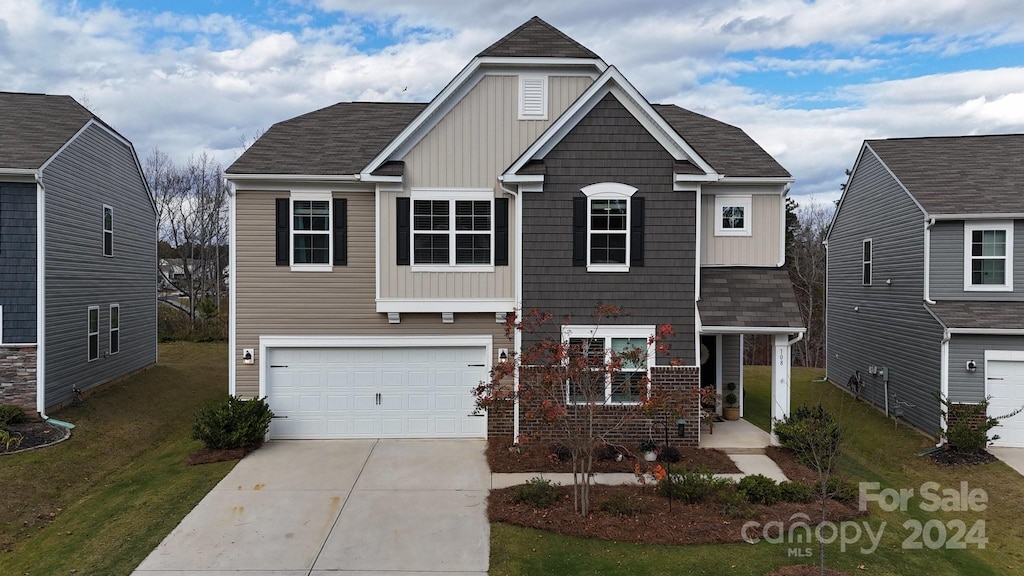 view of front of property with a garage