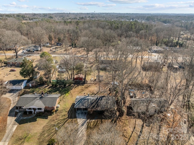 bird's eye view with a forest view