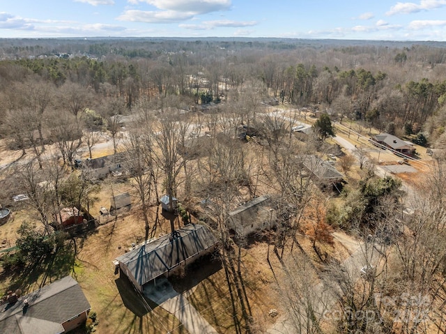 aerial view with a wooded view