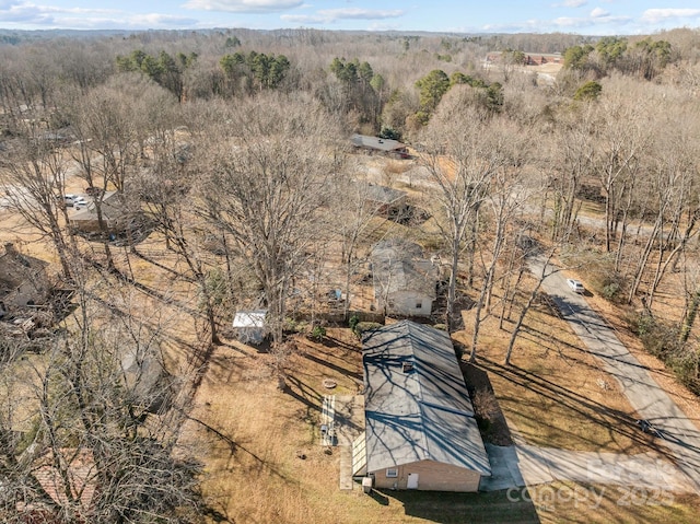 drone / aerial view with a forest view