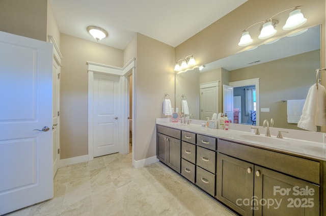 bathroom featuring vanity