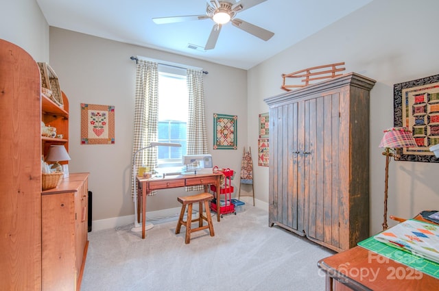 office with ceiling fan and light carpet