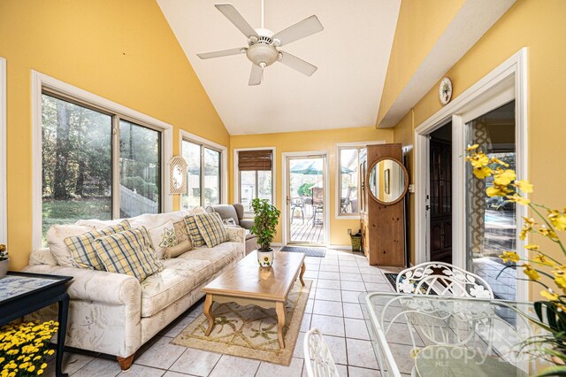 sunroom / solarium featuring ceiling fan and vaulted ceiling