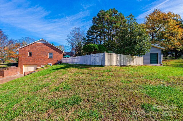 view of yard with a garage