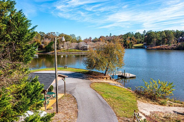 property view of water featuring a boat dock