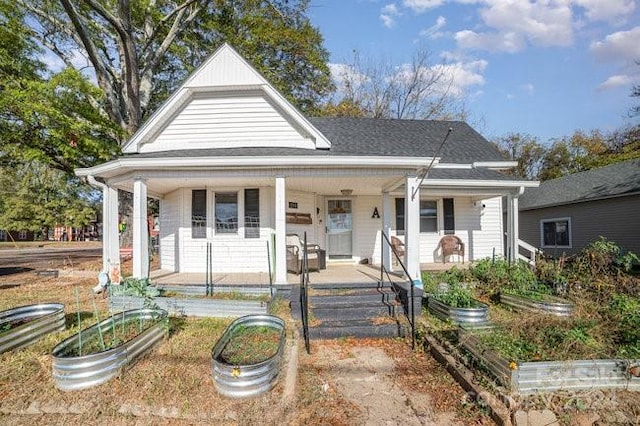 bungalow-style home featuring covered porch