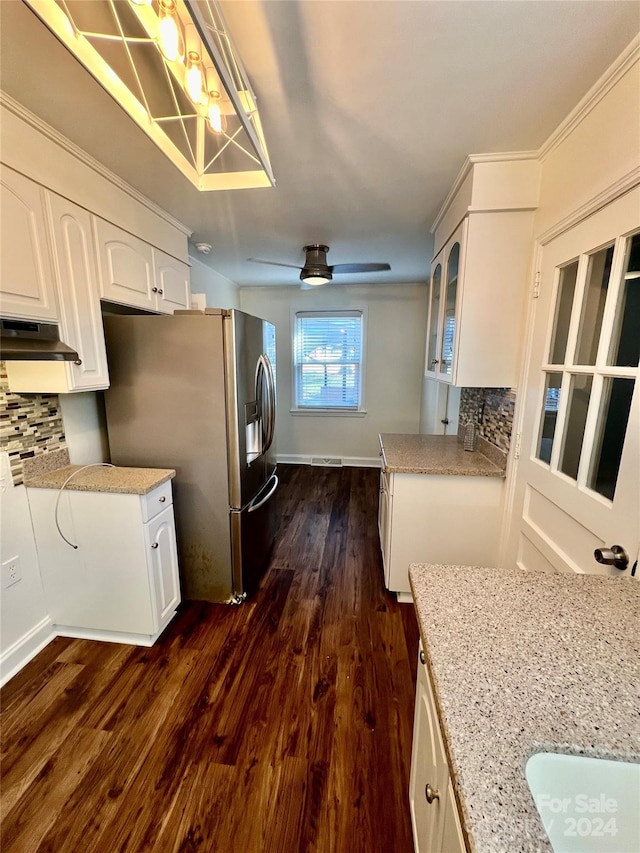 kitchen featuring white cabinetry, ceiling fan, tasteful backsplash, stainless steel fridge with ice dispenser, and dark hardwood / wood-style floors