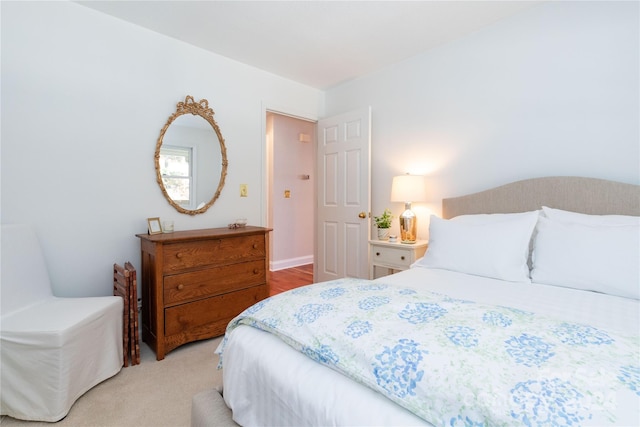 bedroom featuring carpet