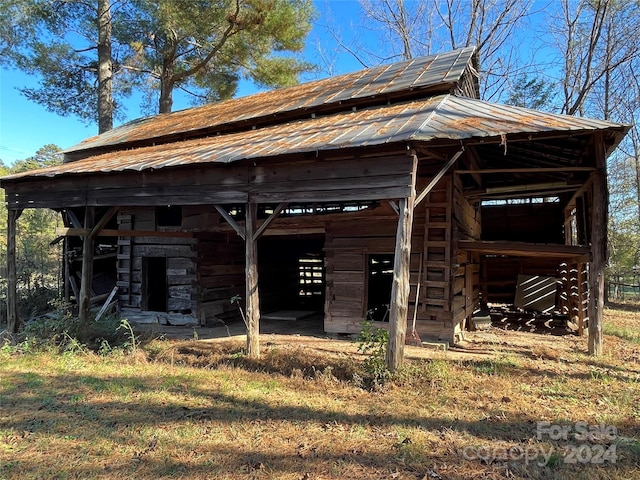 surrounding community featuring an outbuilding