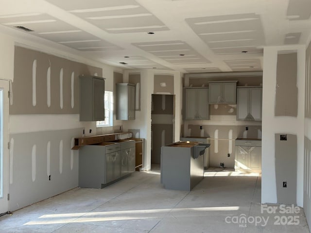 kitchen featuring gray cabinets and a kitchen island