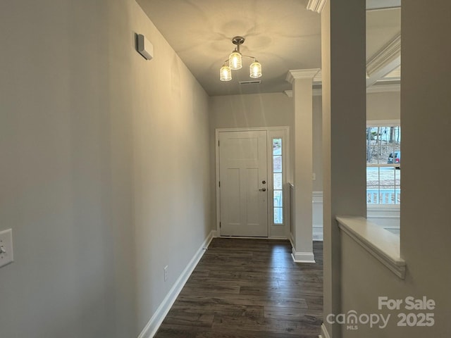 entrance foyer featuring dark hardwood / wood-style floors