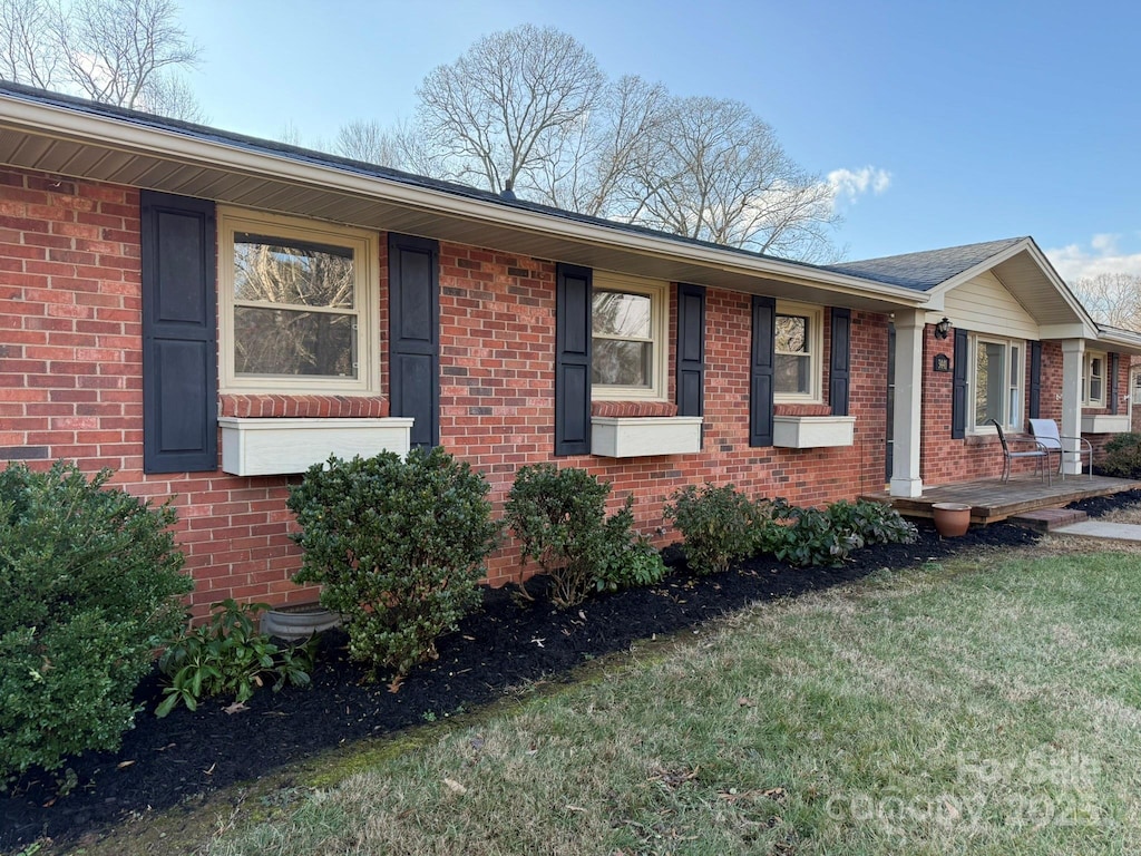 view of property exterior featuring a yard