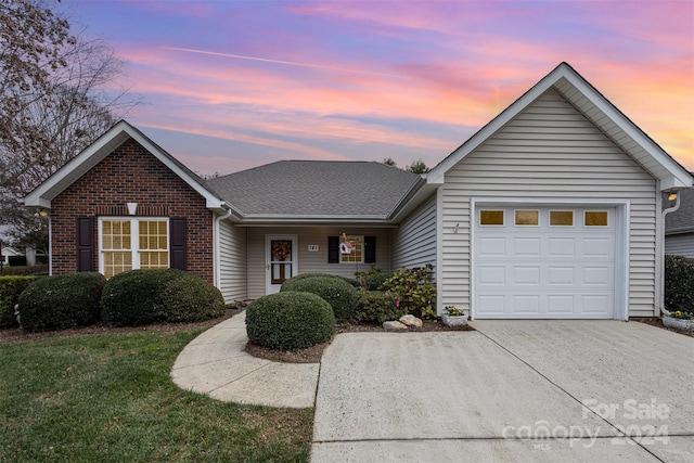 view of front of house with a garage